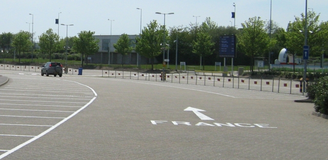 car park with france painted in white on the floor
